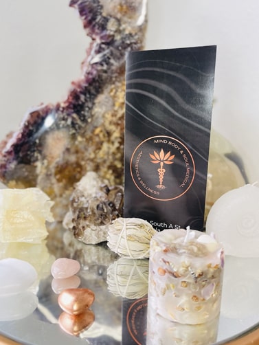 Mind Body & Soul Medical - Brochure and Candle